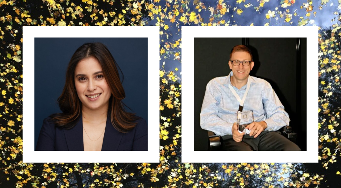 Two polaroid-style photos are displayed side by side against a background of dark foliage with yellow and white flowers.  The left photo shows a woman with long dark hair, smiling, and wearing a dark blazer, posed against a plain dark blue background. The right photo shows a man wearing glasses and a light blue checkered shirt, smiling, and sitting in a chair while holding an award. The background is dark.